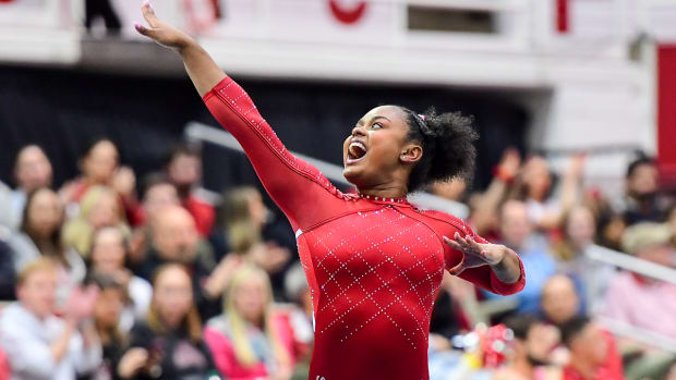 Leah Smith competes for Arkansas on floor against Auburn.
